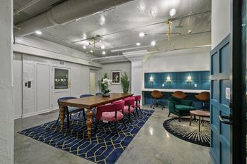 Community workspace with conference table and lounge seating